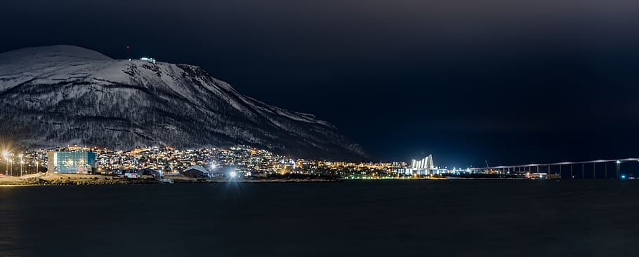 buildings near mountain, night, illuminated, architecture, city HD wallpaper