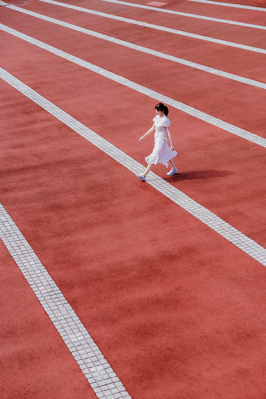 woman in white dress walking on track and field, minimal, creative, HD wallpaper