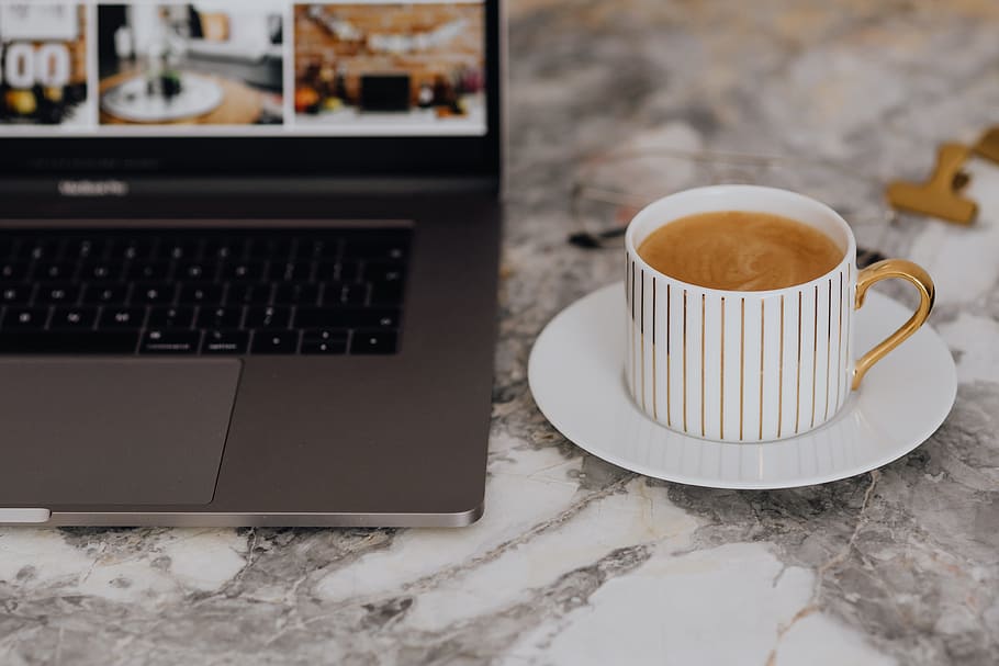 Coffee in a cup on a marble desk, workspace, workplace, cup of coffee HD wallpaper