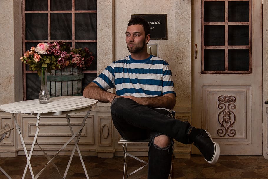 Man Sitting In Chair Facing Sideways, fine-looking, model, paris HD wallpaper