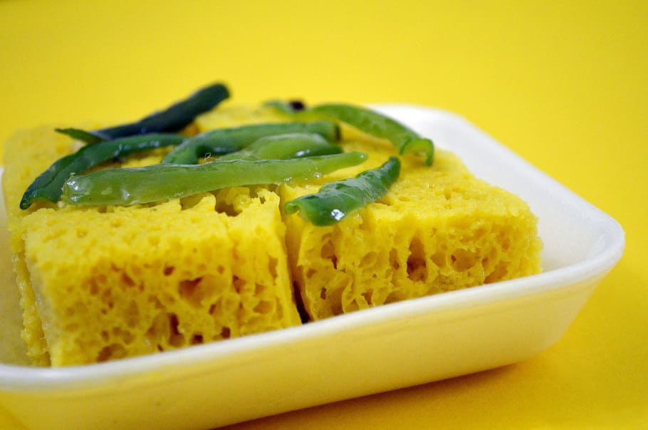 Image of Gujarati Khaman Dhokla Made Using Chana Dal, Served With Green  Chutney, Selective Focus-AM511487-Picxy