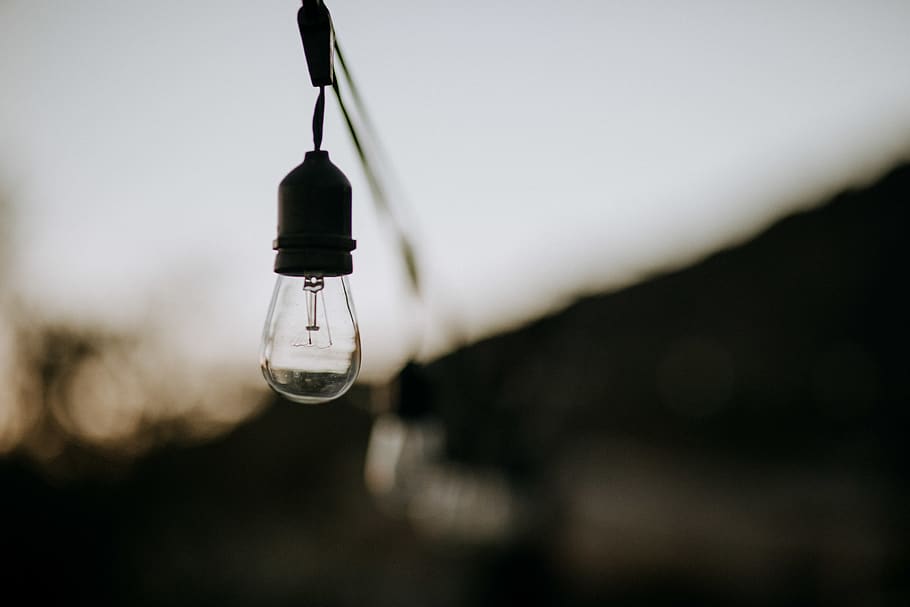 turned-off halogen light bulb, hanging, close-up, focus on foreground, HD wallpaper