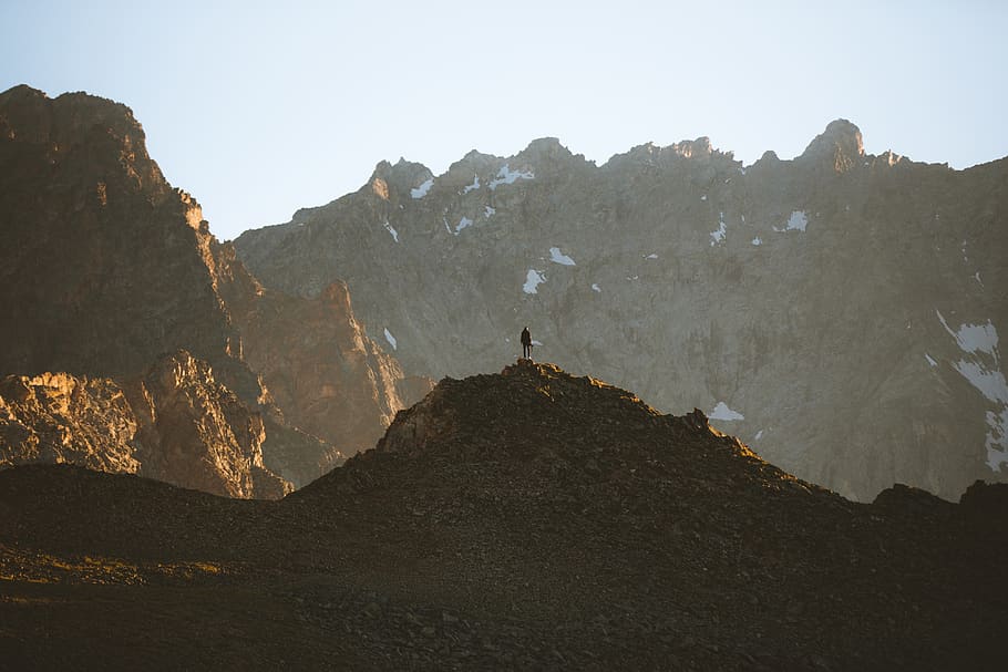 Person Standing Near Mountains, clouds, cold, daylight, environment HD wallpaper
