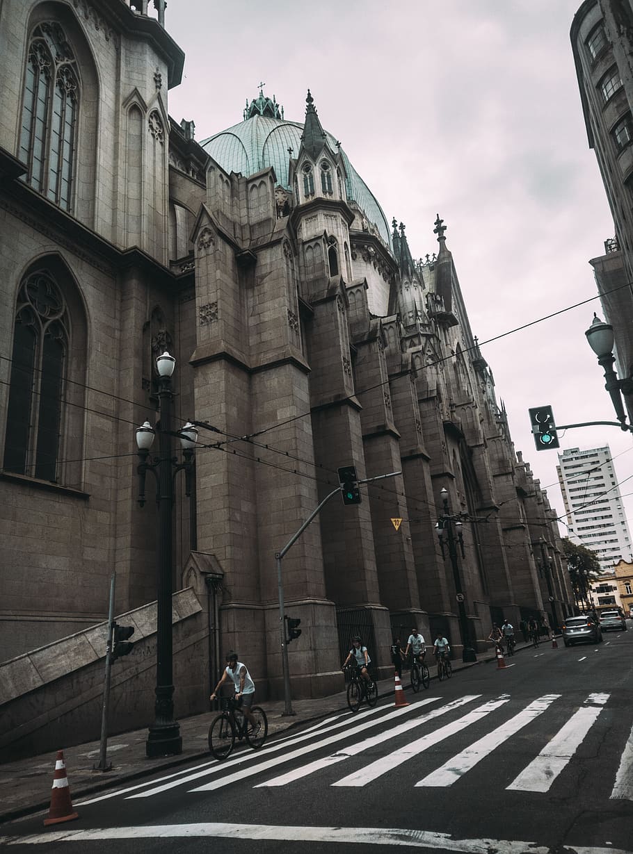 People Riding Bike Near Buildings, architecture, asphalt, basilica HD wallpaper