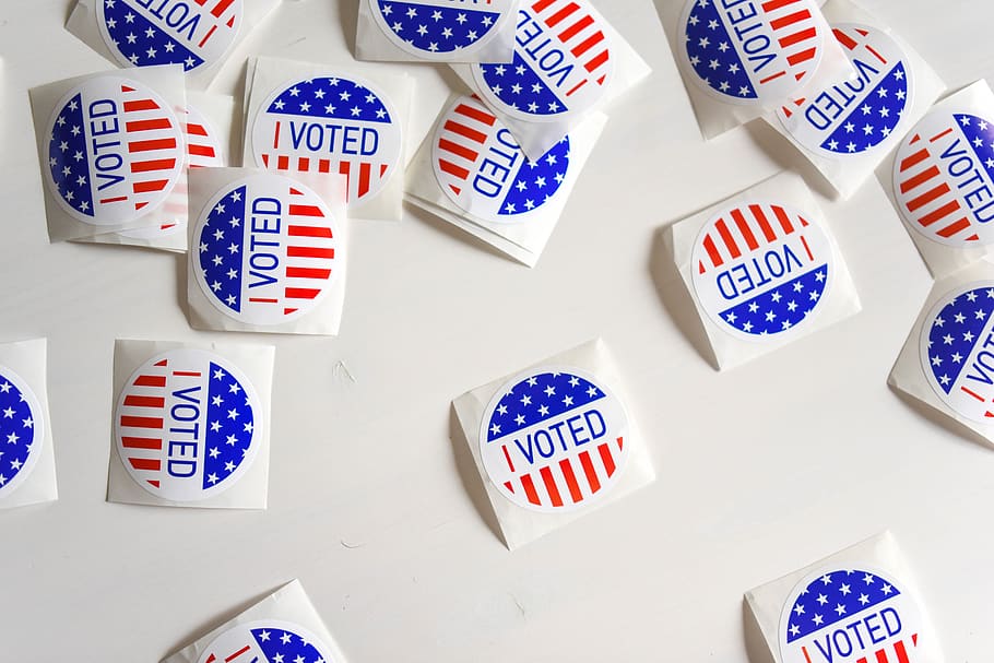Voted printed papers on white surface, flag, patriotism, still life HD wallpaper