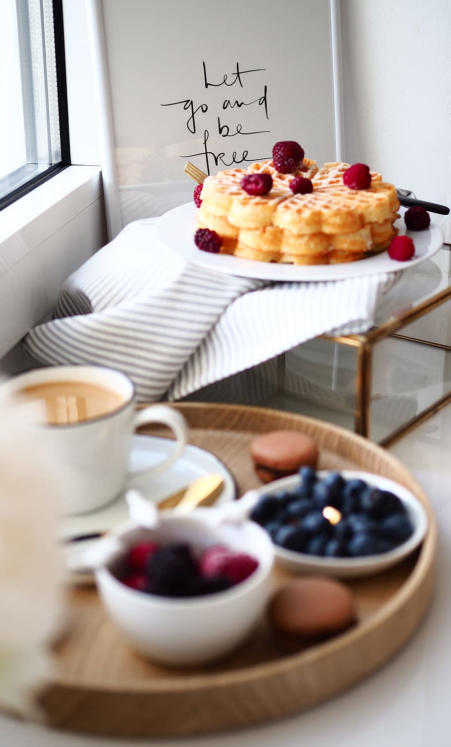shallow focus photography of waffles with raspberries, breakfast