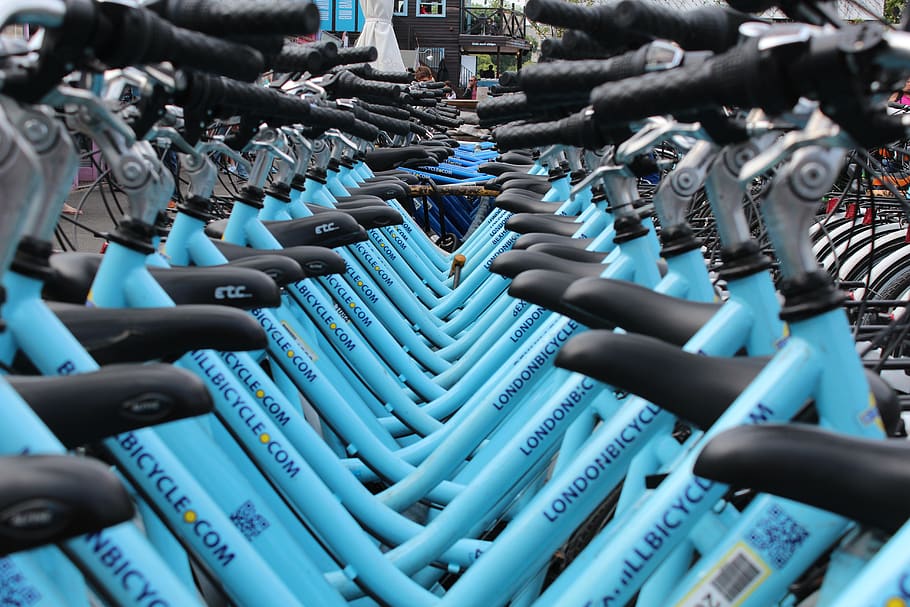 Row of Blue Cruiser Bikes, bicycles, bike racks, city, cycling
