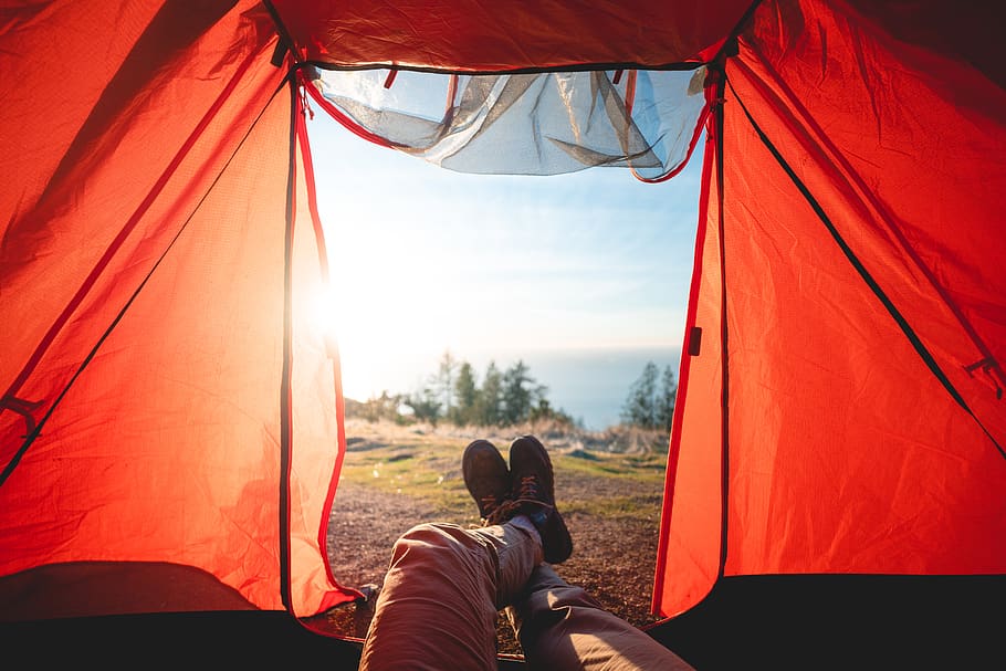 person lying inside tent, camping, human, mountain tent, leisure activities