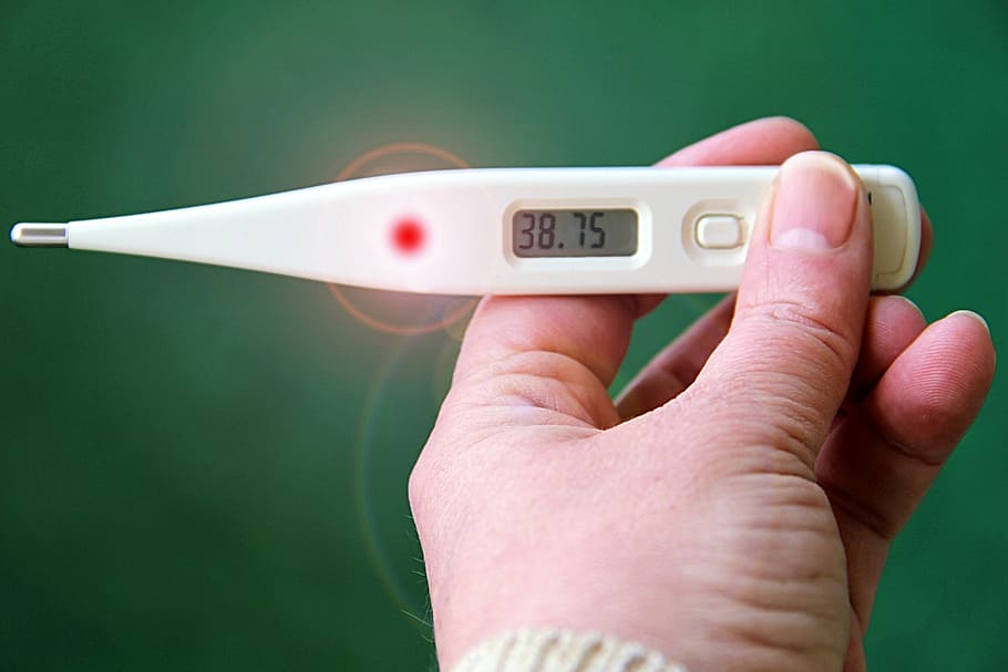 thermometer fever number hand