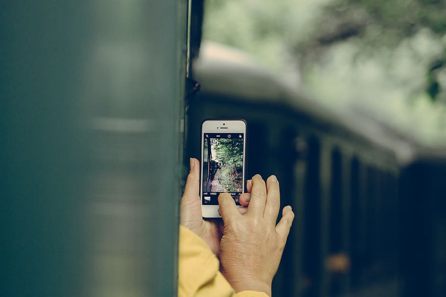 person using iPhone, human hand, holding, one person, technology HD wallpaper