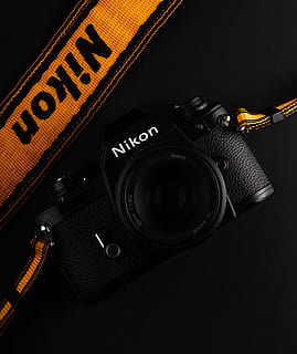 black Nikon body camera, electronics, strap, digital camera, orange HD wallpaper