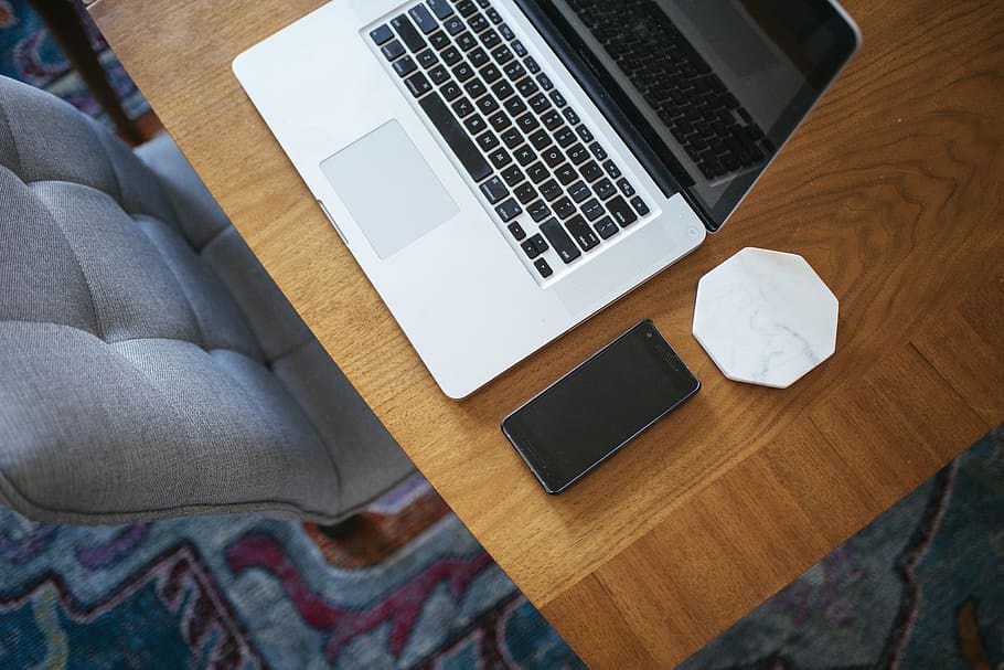 turned off MacBook on brown table, wireless technology, laptop HD wallpaper