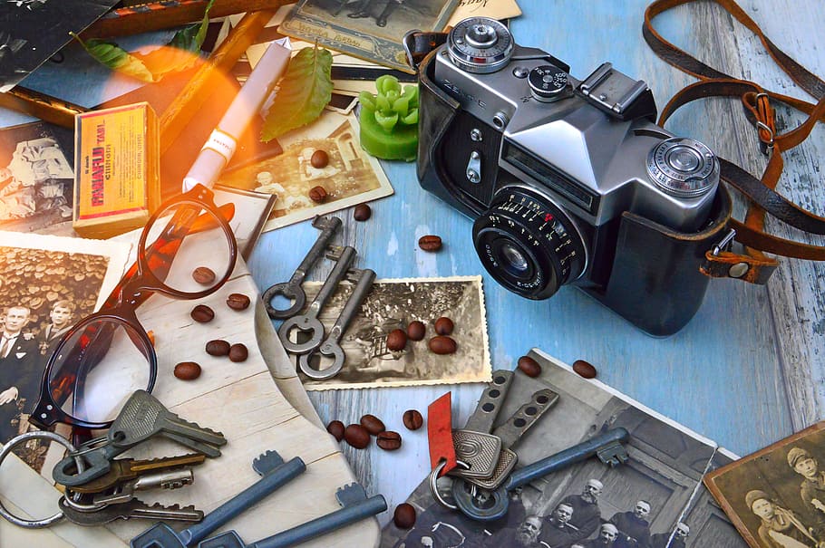 Black and Gray Camera Near Gray Skeleton Keys, camera strap, classic HD wallpaper