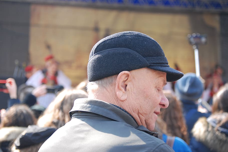 Man Wearing Cap And Grey Coat Surrounded With People, elderly HD wallpaper