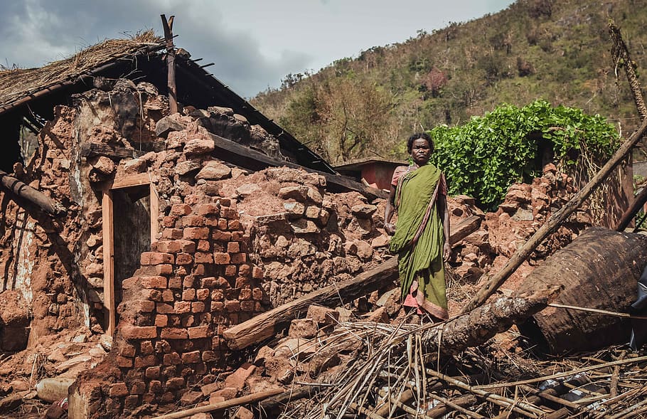 Woman Standing Near House, asia, bricks, broken, calamity, disaster HD wallpaper