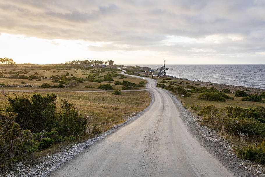 windmill, energy, road, route, path, water, sea, sky, landscape HD wallpaper