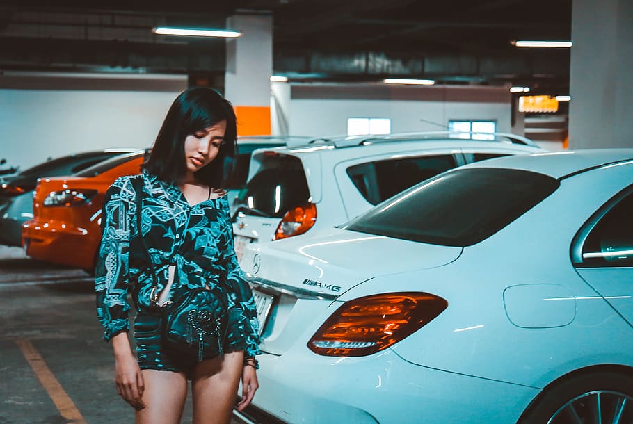 Woman Wearing Blue Printed Romper Standing Beside Car, adult