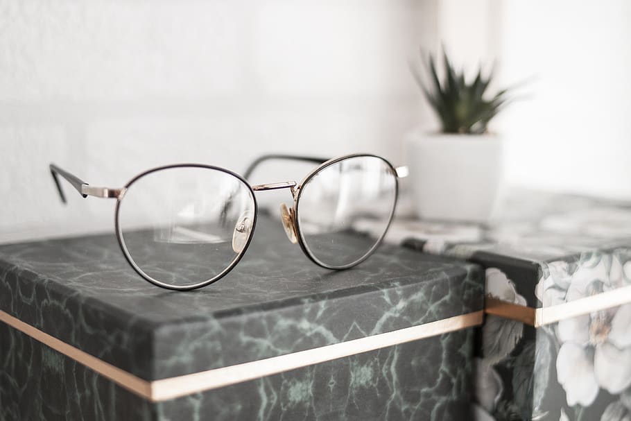 Gray-framed Eyeglasses on Black Surface, boxes, close-up, daylight HD wallpaper