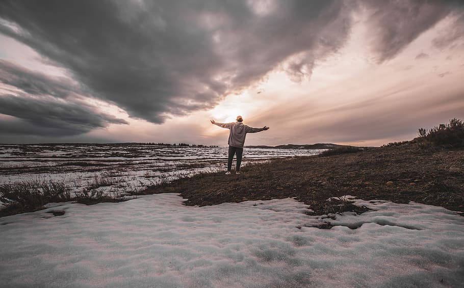 Person Standing on Snowy Field, clouds, cloudscape, cool, dusk HD wallpaper