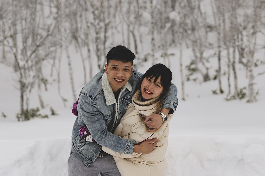 Man and Woman Embracing Each Other on Winter Outdoors, blur, cold HD wallpaper