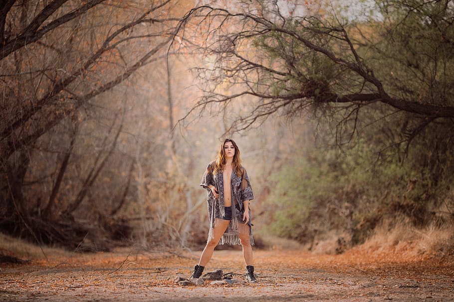 Young Woman Standing In Tree Pose Side View High-Res Stock Photo - Getty  Images