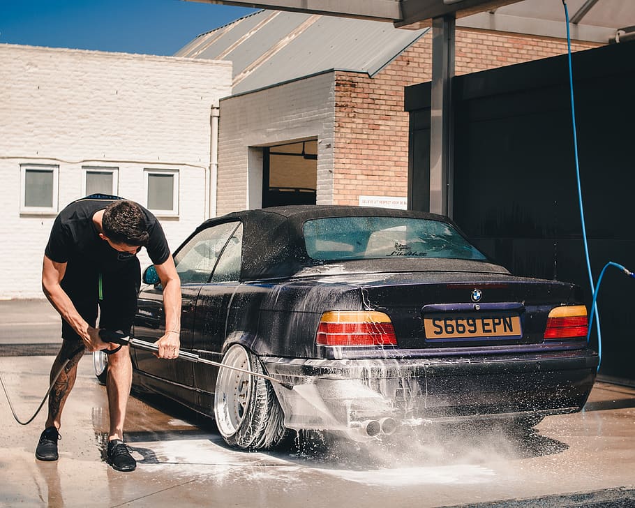 man washing BMW coupe, human, person, car, transportation, automobile