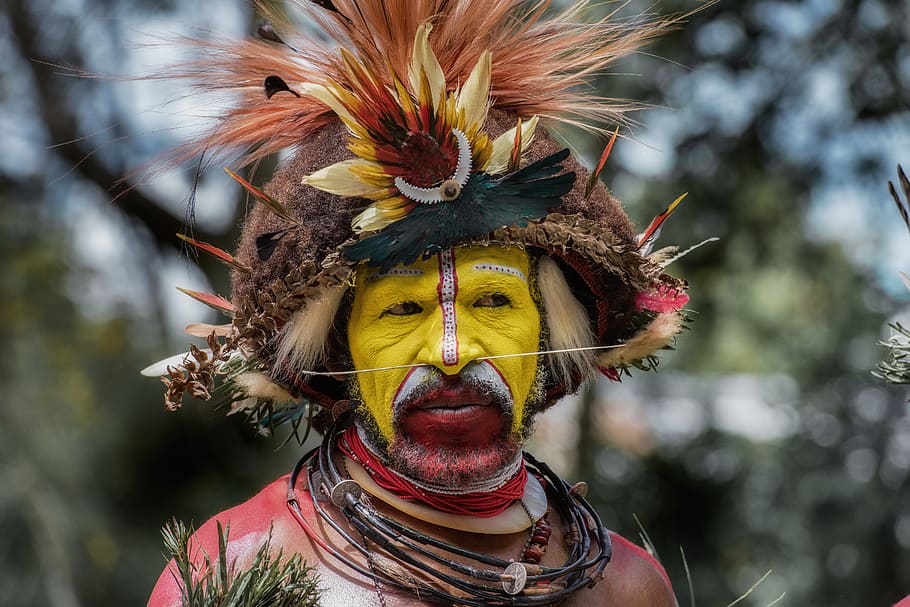 shallow focus photography of man in brown hat, tribe, mount hagen