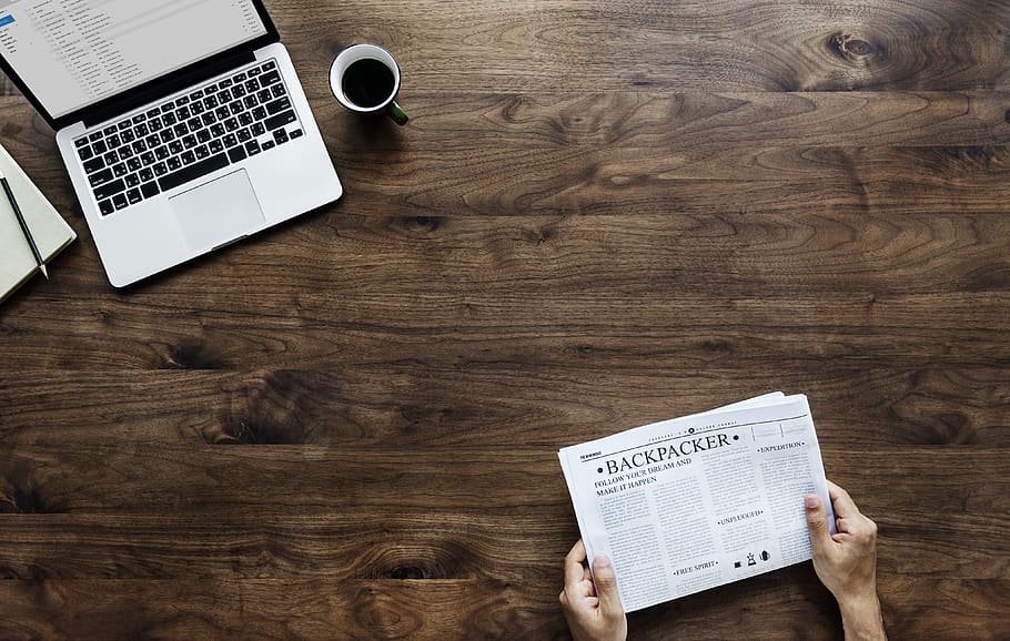 Person Holding White Newspaper on Brown Wooden Surface, coffee HD wallpaper