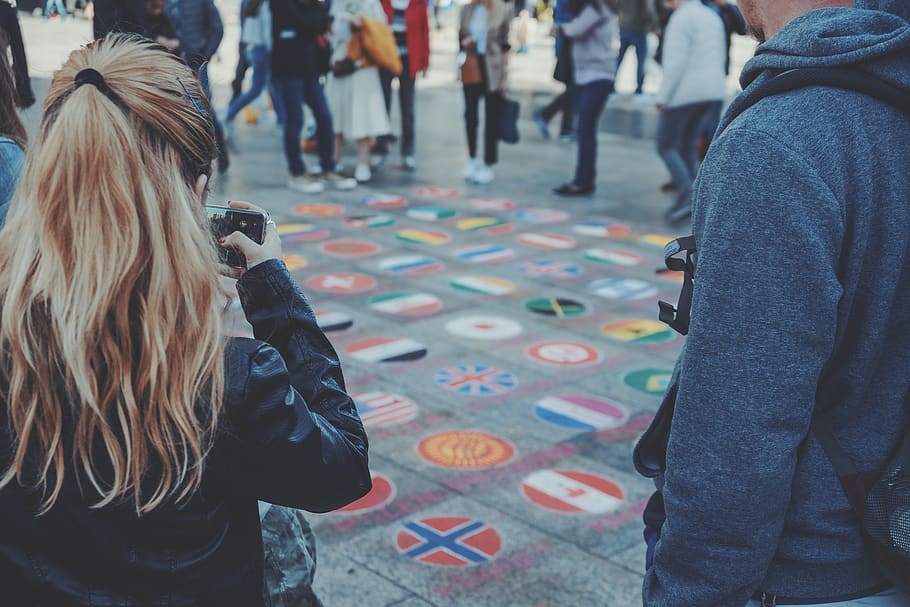 two people standing, street, person, phone, street art, flag HD wallpaper