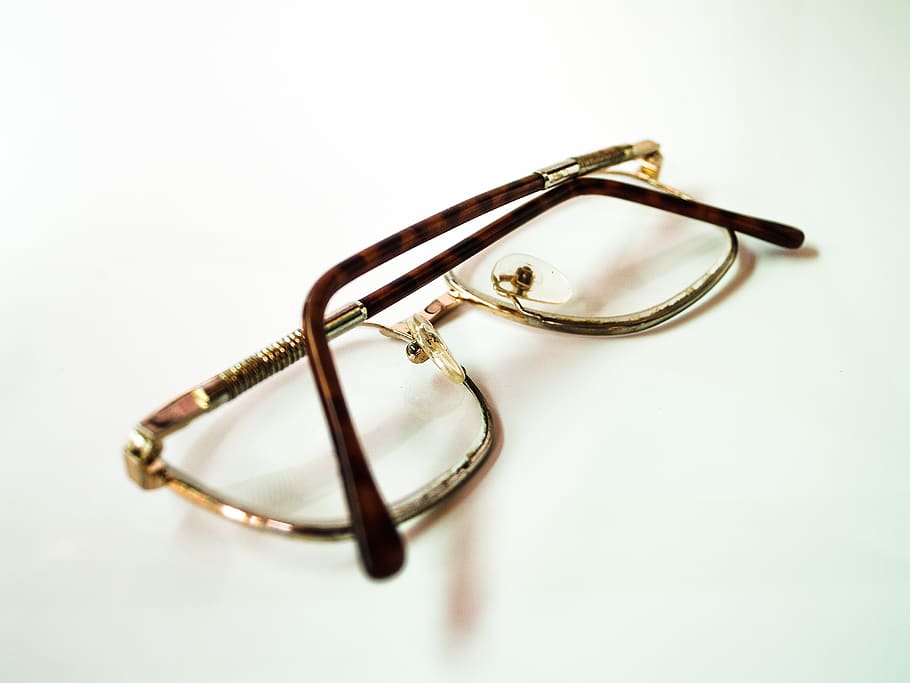 Gold Framed Eyeglasses on White Surface, accessory, clear, close-up HD wallpaper