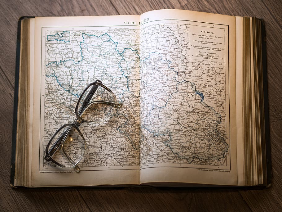 Black Framed Eyeglasses Map in Book, eyewear, information, knowledge HD wallpaper