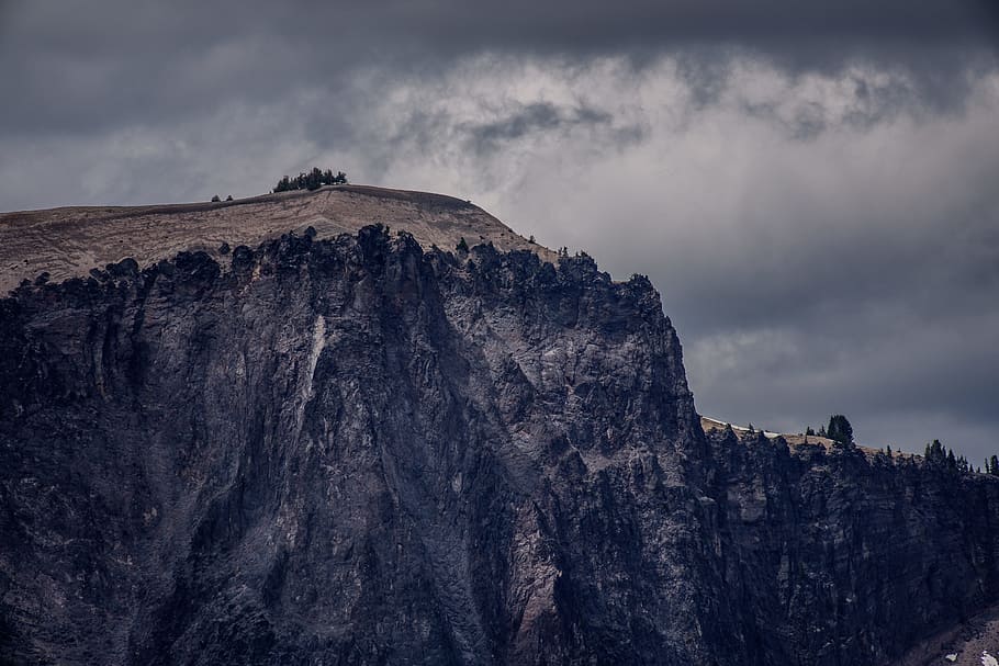 brown rock mountain, cloud, tree, cliff, grey, stormy, gloomy HD wallpaper