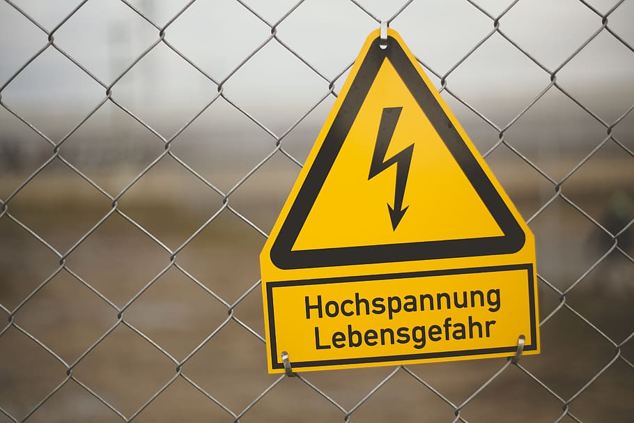 yellow electric sign, germany, bubenreuth, triangle, fence, typography