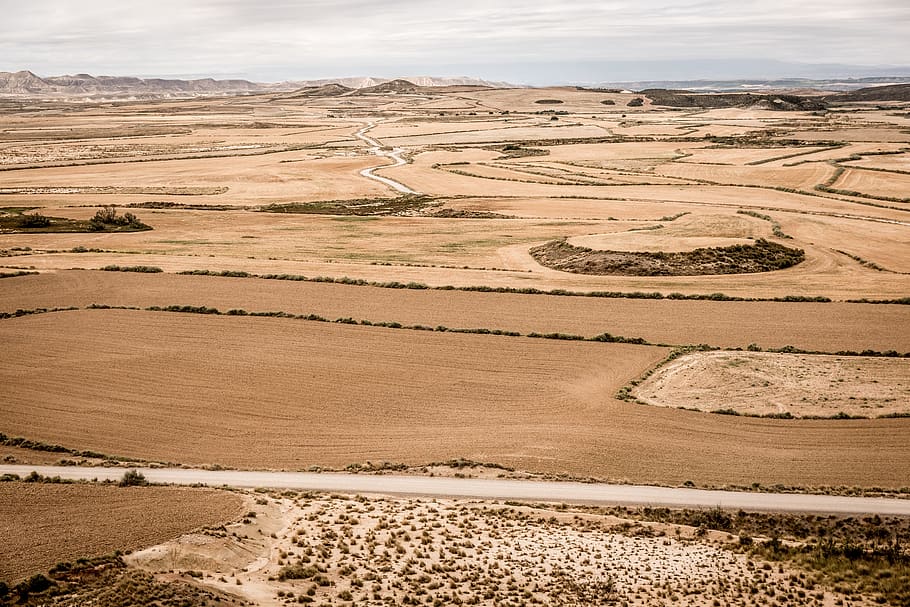 brown field at daytime, soil, spain, bardenas reales, sand, outdoors HD wallpaper