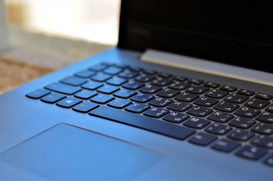 selective focus photography of laptop, keyboard, computer hardware