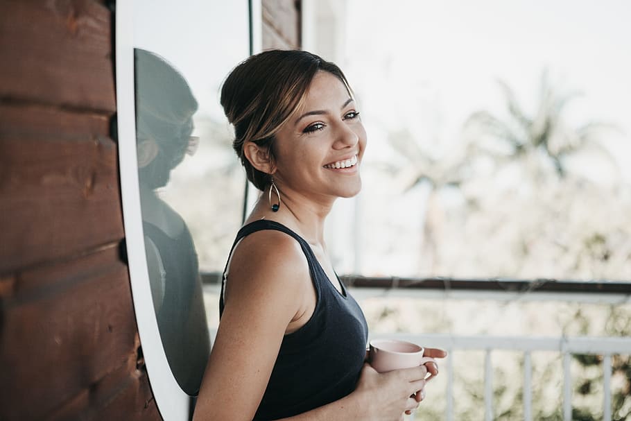 smiling woman in front of window, person, mirror, smile, portrait HD wallpaper