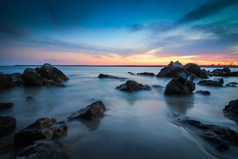 Beach With Rocks, blue, clouds, dusk, evening, golden hour, horizon HD wallpaper