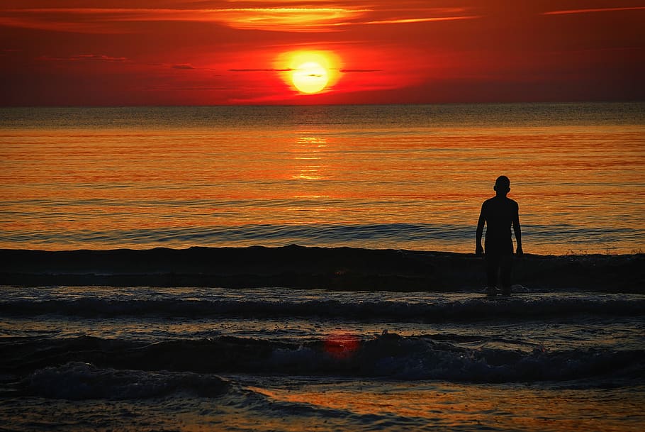 sunset, sea, waves, swimmer, human, silhouette, sky, water HD wallpaper