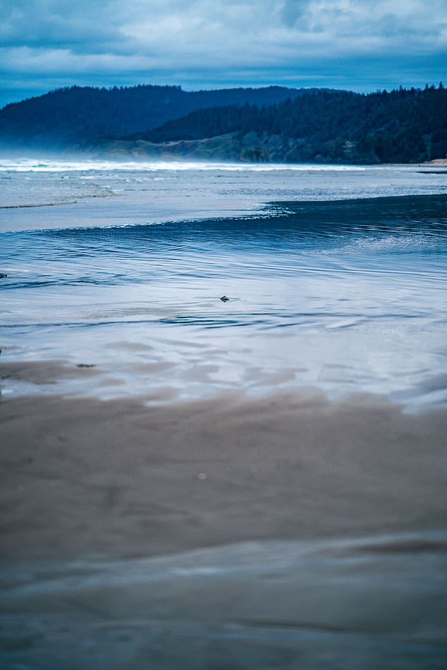 seashore and mountain during day time, water, beach, land, sky HD wallpaper