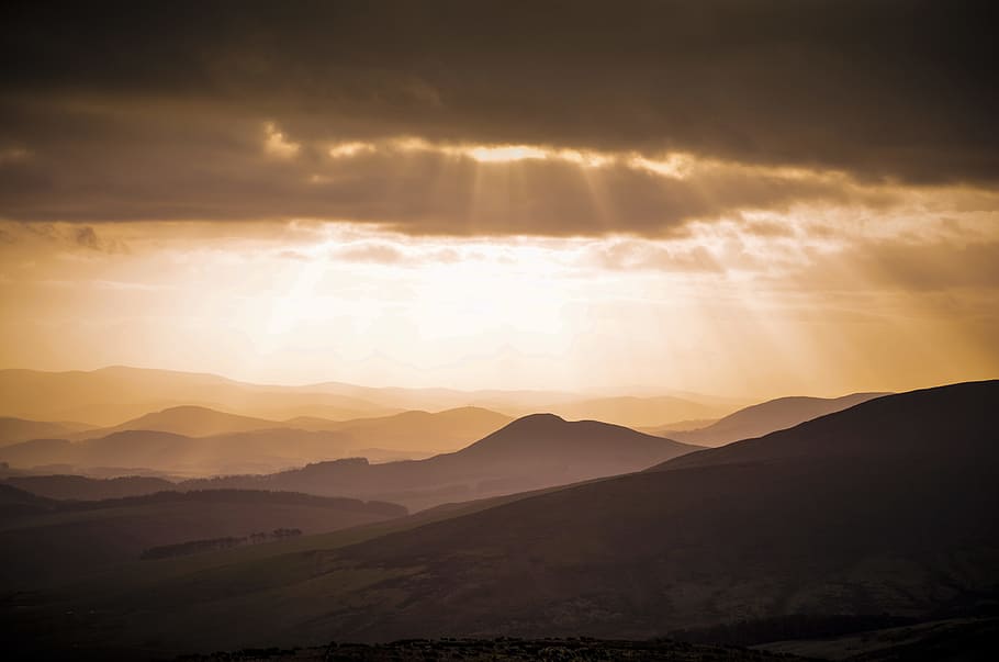 silhouette of mountains, ridge, range, sunlight, ray, orange HD wallpaper