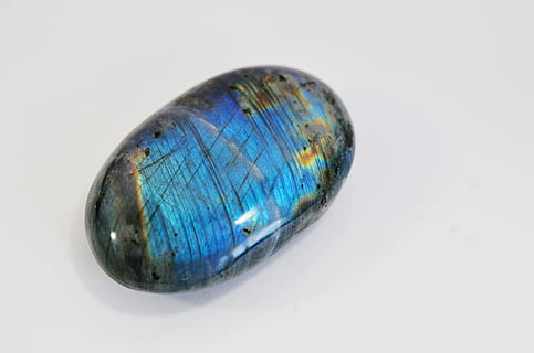 oval blue and black accessory on white surface, crystal, stone HD wallpaper