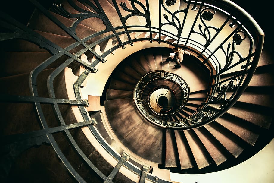 bird's-eye view of person walking on stair, steps and staircases