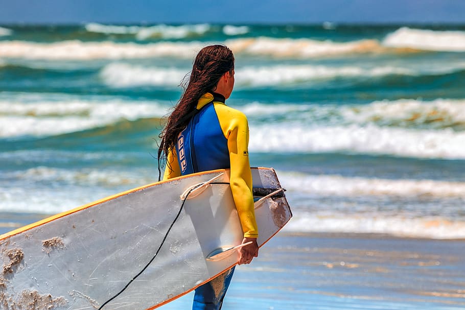 woman carrying surboard, sea, water, outdoors, ocean, nature