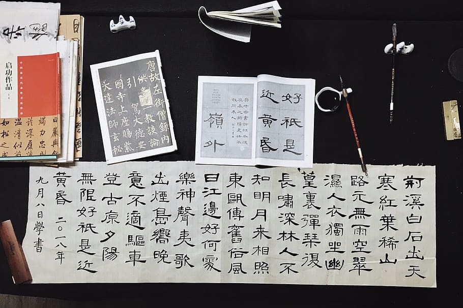 black and white kanji calligraphy poster on top of black table, HD wallpaper