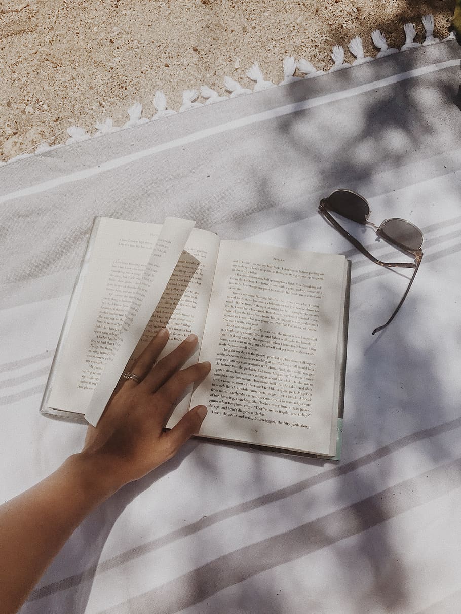 white book page, publication, real people, one person, high angle view HD wallpaper