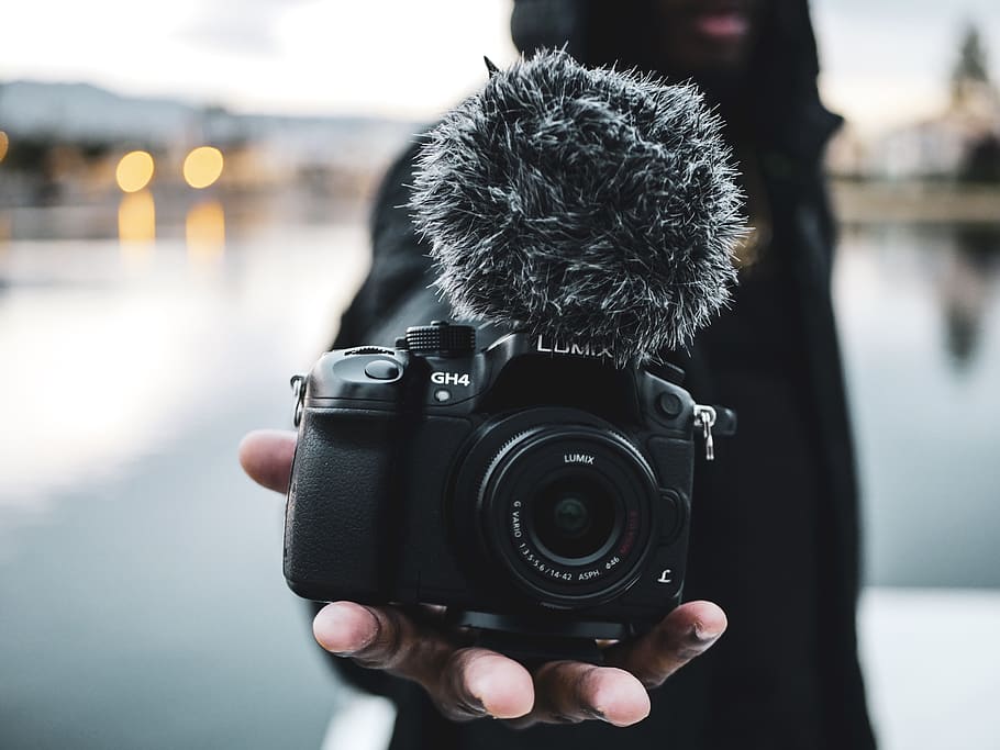 Man Holding Black Dslr Camera, blurred background, close-up, digital camera HD wallpaper
