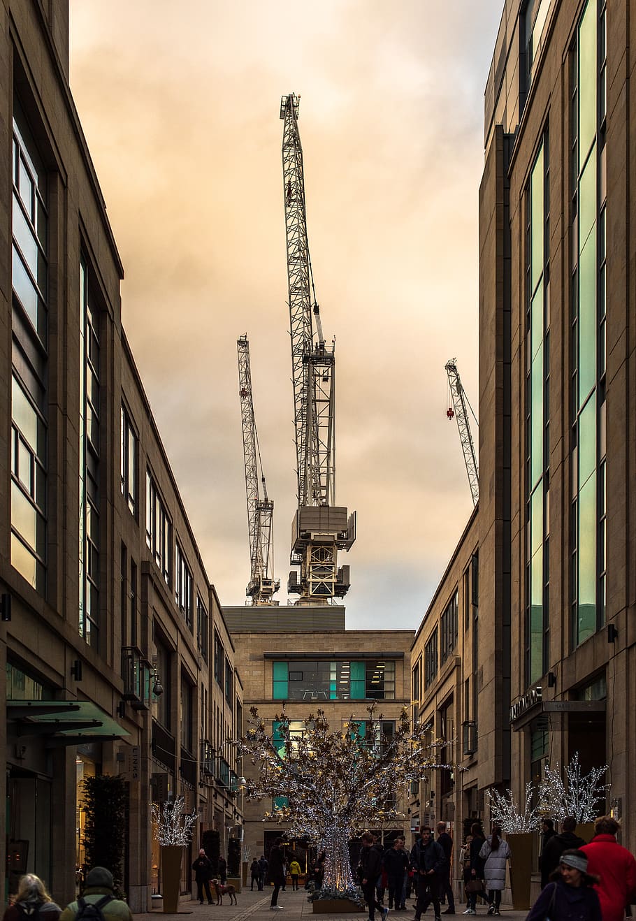 gray hydraulic cranes under white sky, human, person, construction crane HD wallpaper