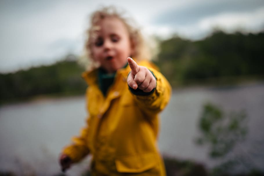 Boy Pointing Finger, adorable, blur, child, cute, fun, happiness HD wallpaper