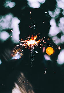 lighted sparkler, #light, #spark, #cracker, #fire, celebration HD wallpaper