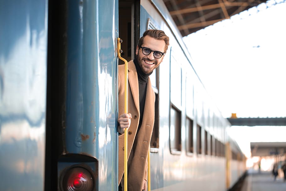 man riding train, one person, young adult, smiling, transportation HD wallpaper
